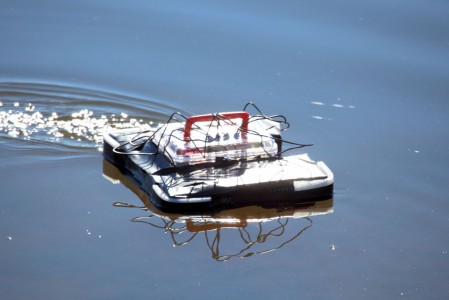 Nice sunny day, perfectly still water, a lunch box floats with one thruster on to skew it to the 'right'...