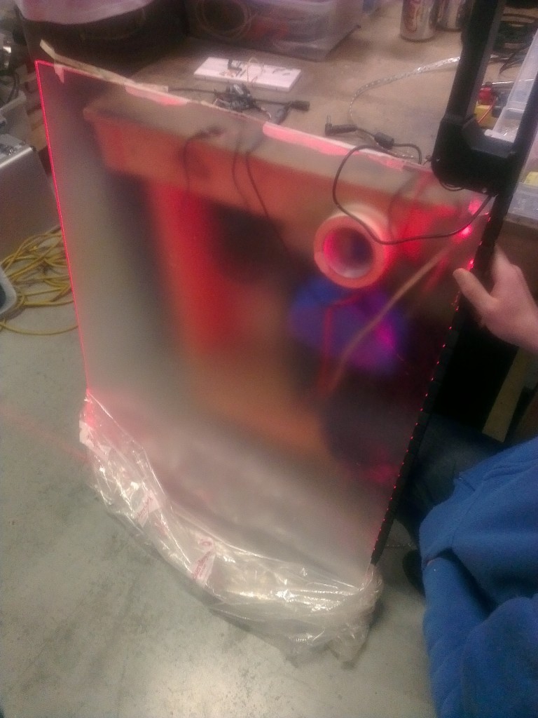 Quirky use of the BBB at the hackerspace to side illuminate an acrylic panel